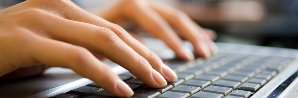 Writer working at a keyboard